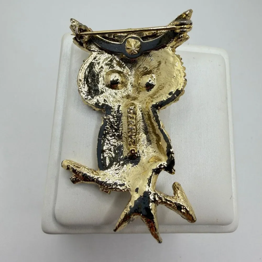 Vintage Gerry's gold tone owl brooch/pin with red rhinestone eyes!